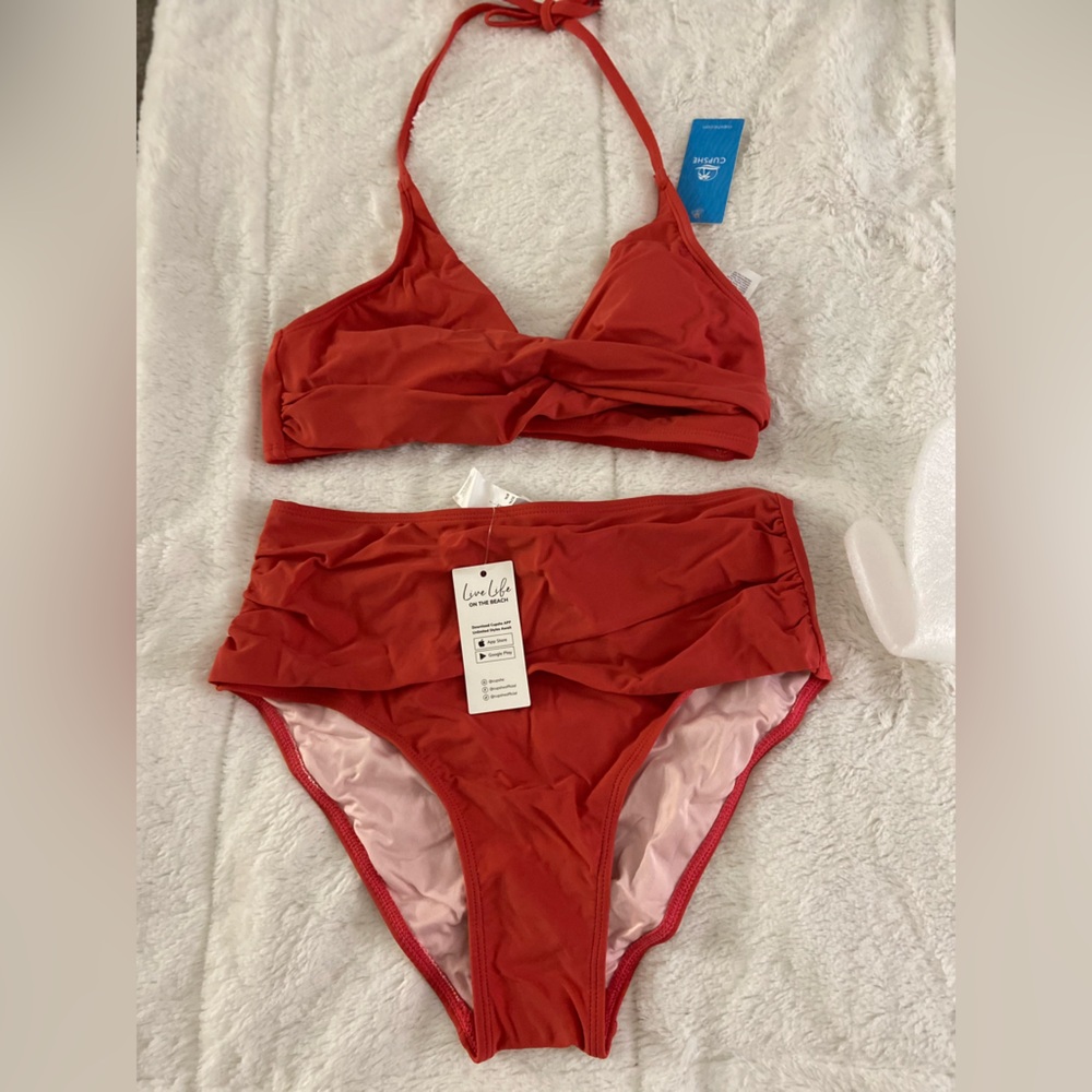 This is a very cute bathing suit. Brand new. I just don’t fit in it